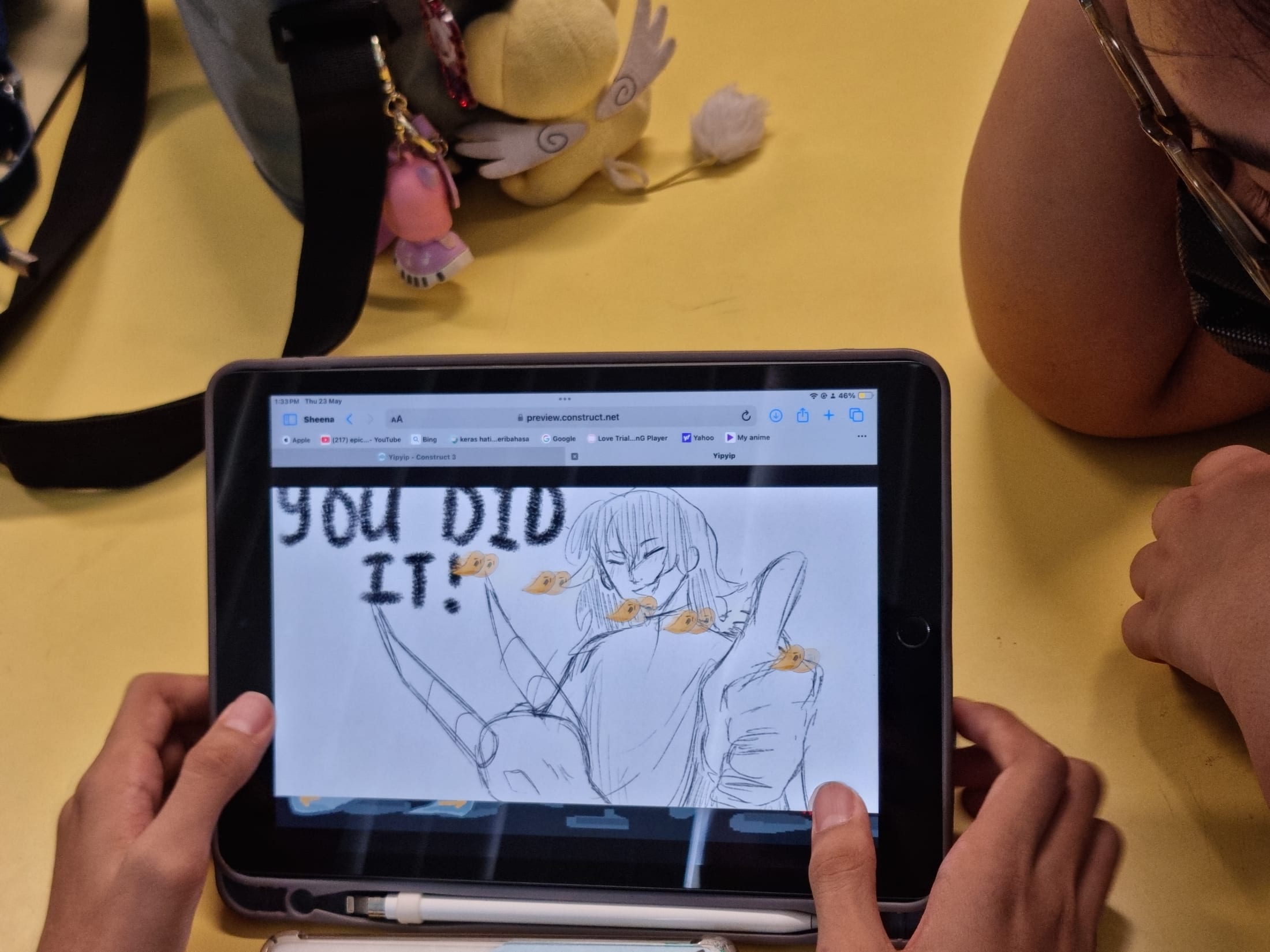 A student designing a layout on a tablet during a DotCode Campus class