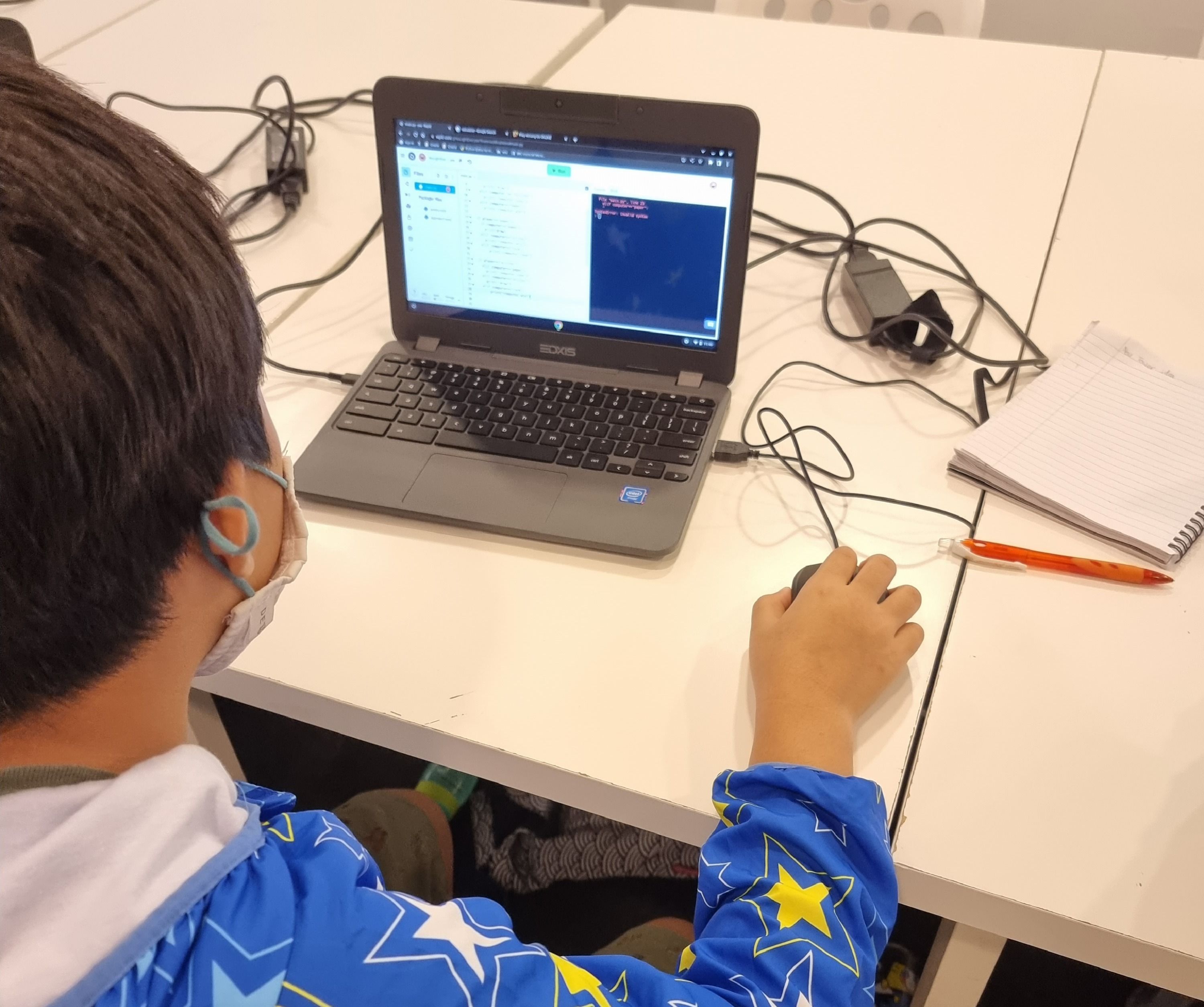 A DotCode Campus student focused on coding their project